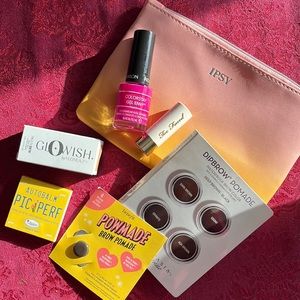 Cute Ipsy makeup bag filled with goodies. :)